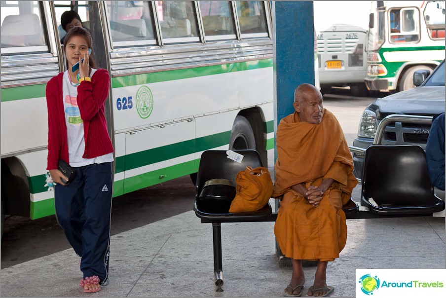 Old monk at the bus station