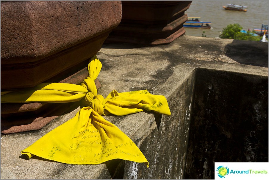A piece of yellow rag with messages
