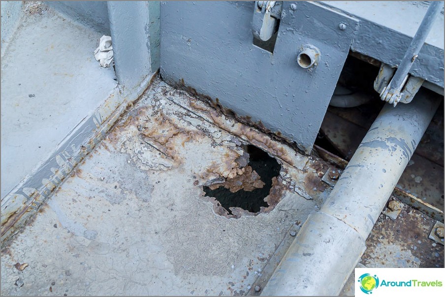 In some places, rust has made holes.