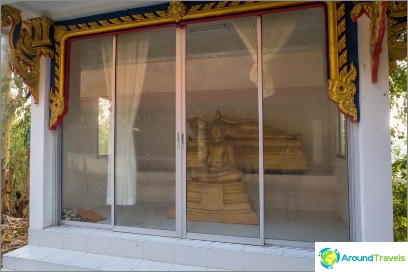 Buddha statues in closed pavilions