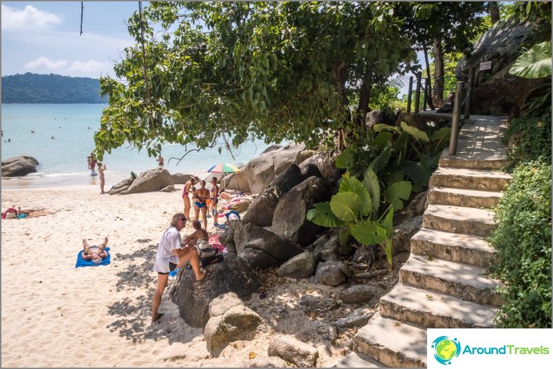 Descend the stairs to the beach