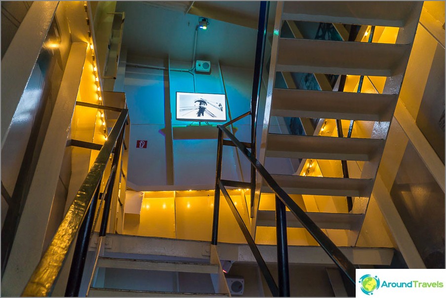 From the elevator you need to climb the stairs
