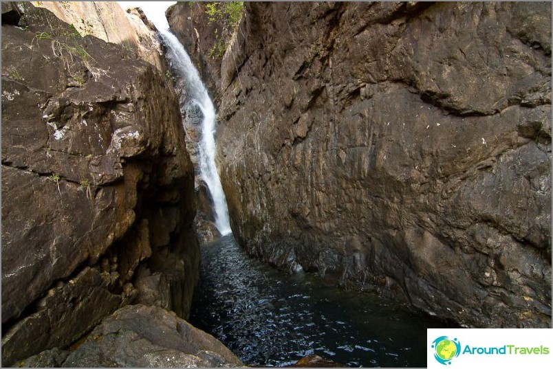 The upper cascade of the waterfall is visible if you climb the ledge