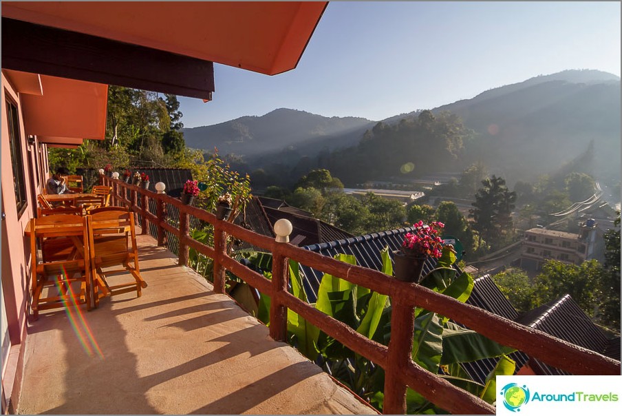 The veranda overlooks the mountains and the village.